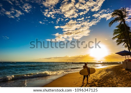 Surfer At Sunset On Waikiki Beach, Hawaii, Oahu, Honolulu