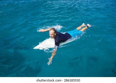 Surfer  with a surfboard  