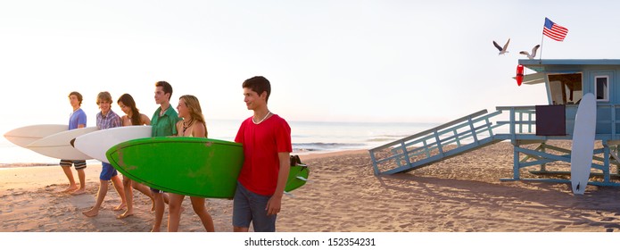 Surfer teenagers boys and girls walking on California beach at Santa Monica [ photo-illustration] - Powered by Shutterstock