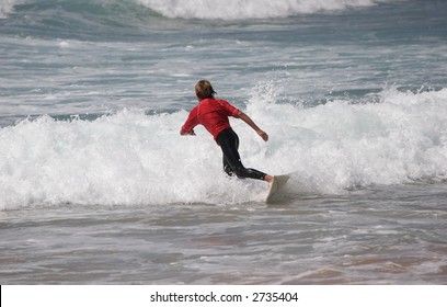 Surfer in the waves