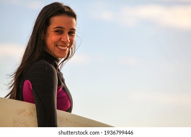 Surfer Woman Portrait Smiling In Sunny Day