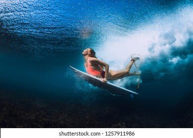 Surfer Woman With Surfboard Dive Underwater