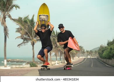 Surfers having fun with surfboards on the road
 - Powered by Shutterstock