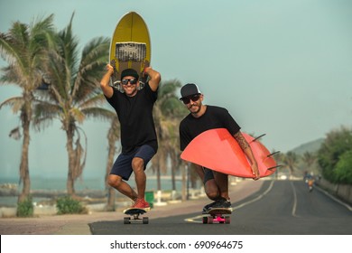 Surfers having fun with surfboards on the road - Powered by Shutterstock