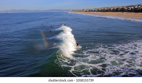 Surfers At Huntington Beach California.