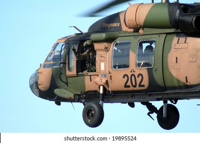 SURFERS PARADISE, Australia - October 26, 2008: Australian Army Blackhawk Flies By With Soldier Giving Thumbs Up At The Indy 300, Surfers Paradise, Australia.