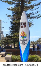 SURFERS PARADISE-OCTOBER 15: The 2018 Commonwealth Games countdown clock shaped as a surfboard is four meters tall and stands at the beach end of Cavill Ave. Oct 15, 2013 Surfers Paradise, Australia 