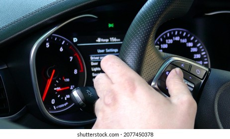 Surfing in Additional car control instruments on car dashboard using modern sensor button on the wheel.