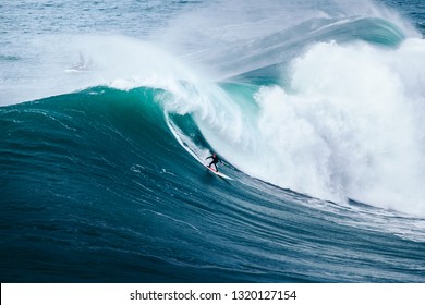 Surfing Big Waves In Nazare, Portugal