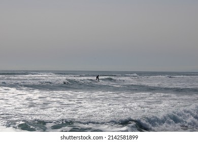 Surfing In Kamchatka. Surfing On The Pacific Ocean