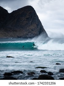 Surfing In The North. Ice Cold Water In Lofoten.