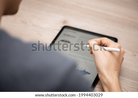 surfing the web on a tablet