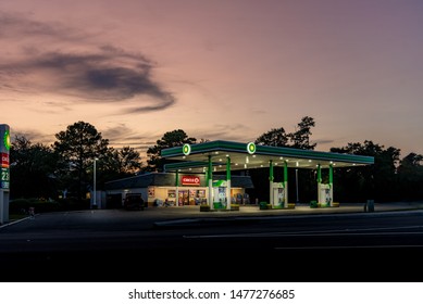 old gas station at night