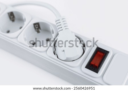 surge protector with electrical sockets.