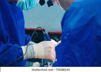 Surgeon Doctor Operating Wearing Special Lamp Lighting Using Electric Cautery Heart Surgery Intervention Close-up, Open Cord Surgery Minimally Invasive Surgery