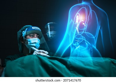 Surgeon Female Doctor Using Holographic Simulation Technology Concept, Operating Procedure On Patient Using Computer Ai Tech Assistant, Operating On Human Body Medical Healthcare Futuristic Innovation