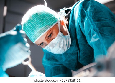 Surgeon focusing on brain surgery in an operating room