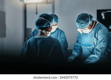 Surgeon team, people and operating room at hospital in scrubs, ppe and help for emergency healthcare procedure. Doctors, group and together in icu, medical surgery and services for wellness at clinic - Powered by Shutterstock