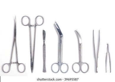 Surgeon tools - surgical scalpel, forceps, clamps, scissors for surgery - isolated on white background