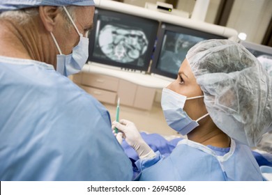 Surgeons During An Operation