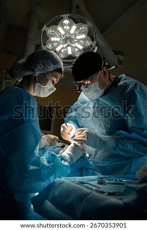 surgeons perform plastic surgery in operate room