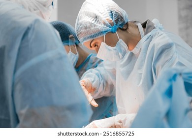 Surgeons performing a delicate operation in a modern operating room, surrounded by advanced medical equipment. The photo captures a moment of precision and expertise in a high-tech environment. - Powered by Shutterstock