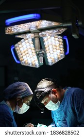 surgery doctor is operating with her nurse health workers