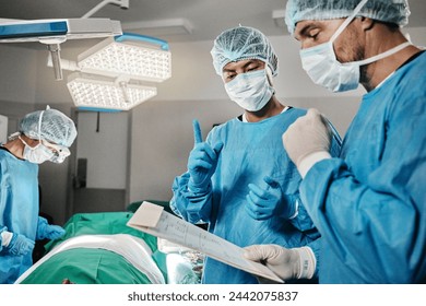 Surgery, documents or surgeons with teamwork for emergency, accident or healthcare in hospital. Paperwork, medical checklist or doctors in surgical collaboration in operating room to support or help - Powered by Shutterstock