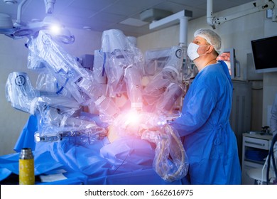 Surgery, Healthcare, Medicine And People Concept. Surgeon Operating In Operating Room At Hospital. Close Up.