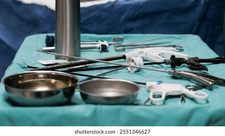 Surgical instruments on table during the operation.Laparoscopic bariatric or obesity surgery instrument set.Gastric sleeve surgery.