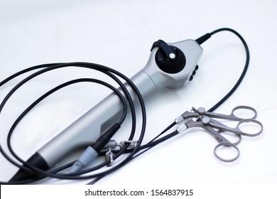 Surgical Laparoscapia Camera, Minimally Invasive . The Latest Technology, A Modern Device For Endoscopy Surgery, Medical Instrument For Surgeons Manufacturing Germany On A White Background