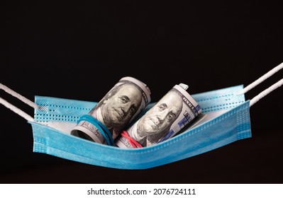 Surgical Mask As Hammock With 100 Dollar Banknotes