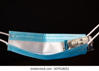 Surgical Mask As Hammock With 100 Dollar Banknotes