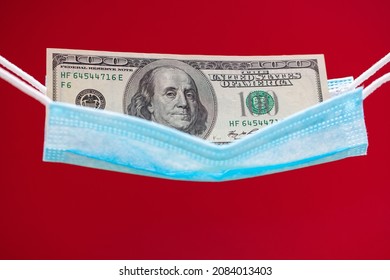 Surgical Mask As Hammock With 100 Dollar Banknotes