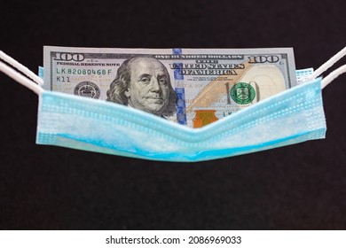 Surgical Mask As Hammock With 100 Dollar Banknotes