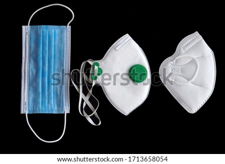  Surgical mask and medical masks FFP2 / FFP3 / N95 / KN95 for protection against diseases, virus, flu, coronavirus COVID-19, pollution. Personal protective equipment PPE. Different types of face mask. Stock photo © 