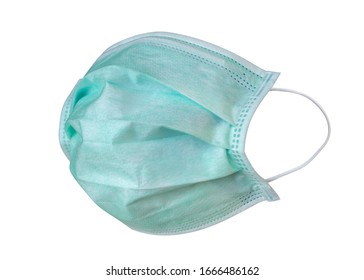 Surgical mask with rubber ear straps for cover mouth and nose to protect virus or bacteria isolated on white background, clipping path included - Shutterstock ID 1666486162