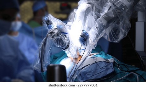 Surgical operation robot  Medical operation involving robot  Robotic Surgery  Manipulators performing surgery humans 