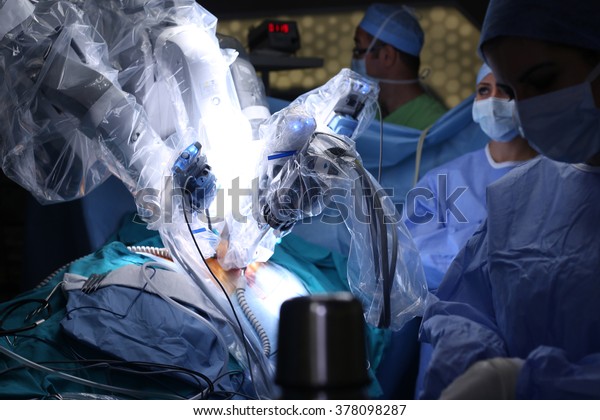 Surgical operation robot.\
Robotic Surgery. Medical operation involving robot. Da Vinci\
Surgery. Minimally Invasive Robotic Surgery with the da Vinci\
Surgical System.
