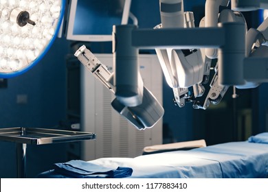 Surgical room in hospital with robotic technology equipment, machine arm surgeon in futuristic operation room. Minimal invasive surgical inoovation, medical robot surgery with 3D view endoscopy
