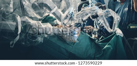 Surgical room in hospital with robotic technology equipment, machine arm surgeon in futuristic operation room. Minimal invasive surgical medical robot,  urology surgery with robotic assisted surgeon