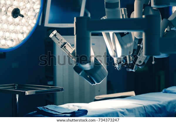 Surgical room in hospital with robotic\
technology equipment, machine arm surgeon in futuristic operation\
room. Minimal invasive surgical inoovation, medical robot surgery\
with 3D view endoscopy
