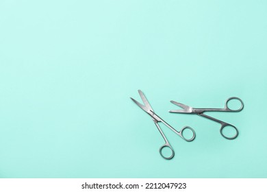 Surgical Scissors On Color Background