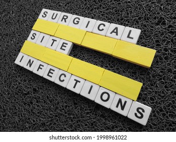 Surgical Site Infections, Word Cube With Background.