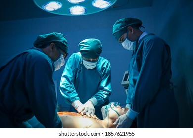 Surgical Team Or Doctor And Staff Have  Vivisection In Surgery Room Of The Hospital