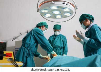 Surgical Team Or Doctor And Staff Have  Vivisection In Surgery Room Of The Hospital