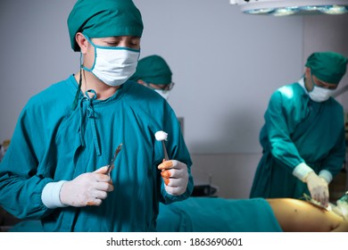 Surgical Team Or Doctor And Staff Have  Vivisection In Surgery Room Of The Hospital