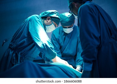 Surgical Team Or Doctor And Staff Have  Vivisection In Surgery Room Of The Hospital