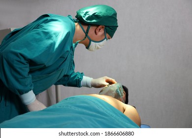 Surgical Team Or Doctor And Staff Have  Vivisection In Surgery Room Of The Hospital