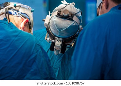 Surgical team operating a patient in an operation theater. Surgeon at work in the hospital. Medicine doctor. Cardiac surgery. Heart transplantation. Surgical equipment and instruments.
